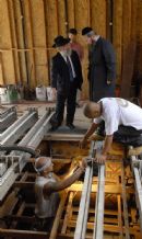 Rabbi Berkowitz and Rabbi Katz as the ready to pour the cement. Rabbi Berkowitz and Rabbi Katz as the ready to pour the cement.